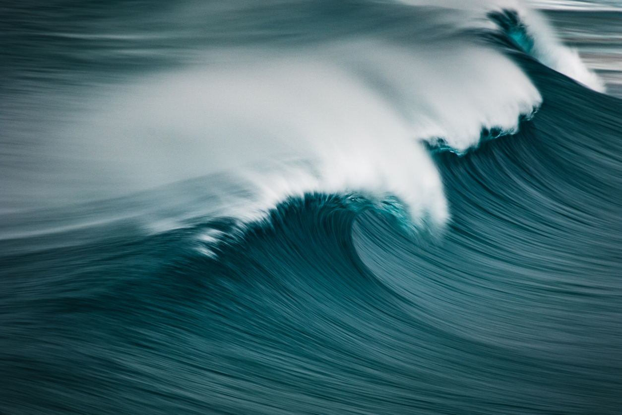 A slow shutter speed shot of waves crashing.