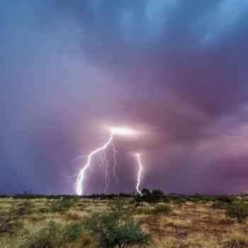 A storm over the dry landscape of the Pilbara.