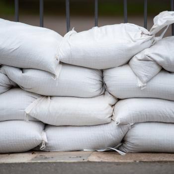 A stack of white sandbags.