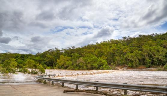 Flooded bridge at Russet Park near Kuranda on the Atherton Tableland in Tropical North Queensland, Australia.