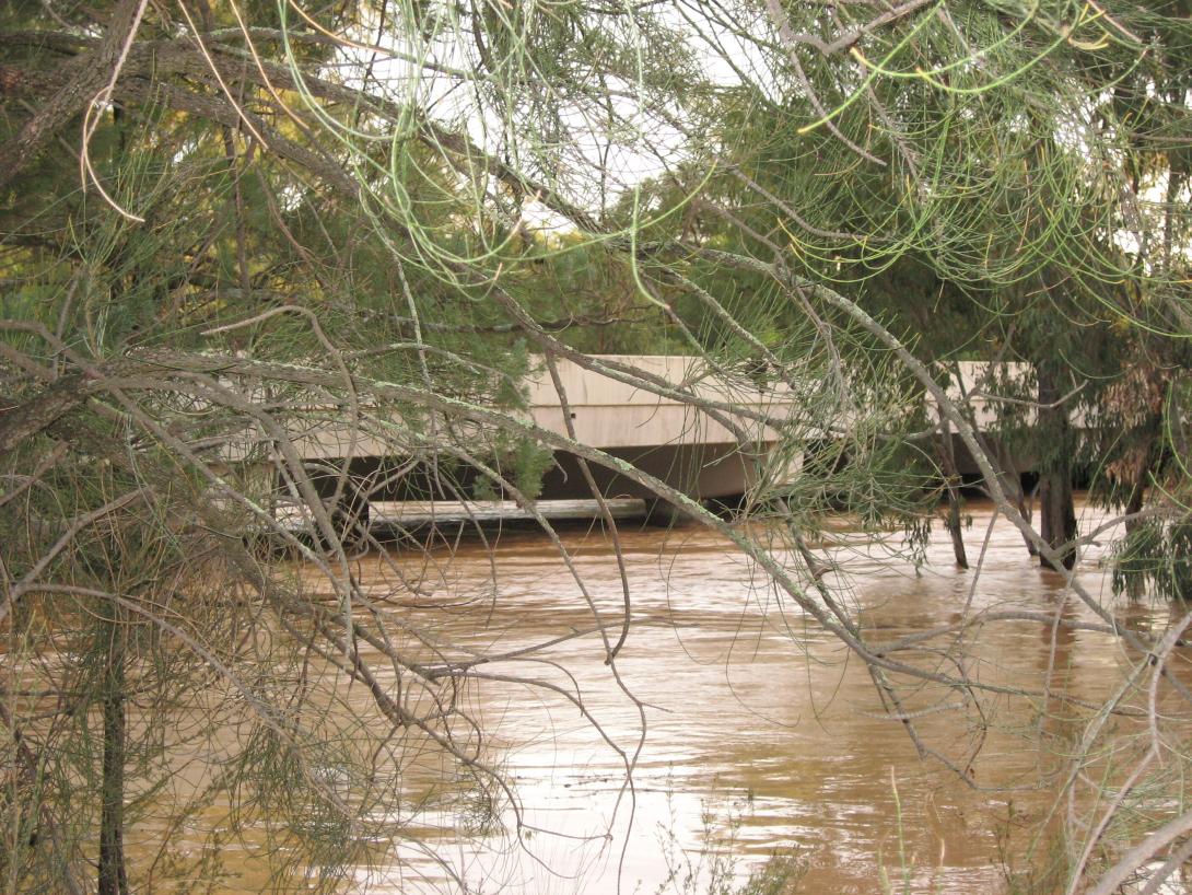 Flood water under a bridge